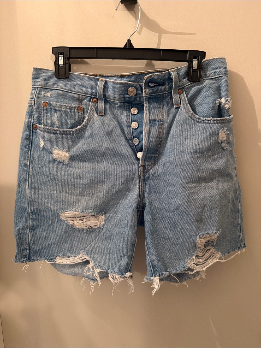 High-Rise Light Blue Distressed Denim Shorts